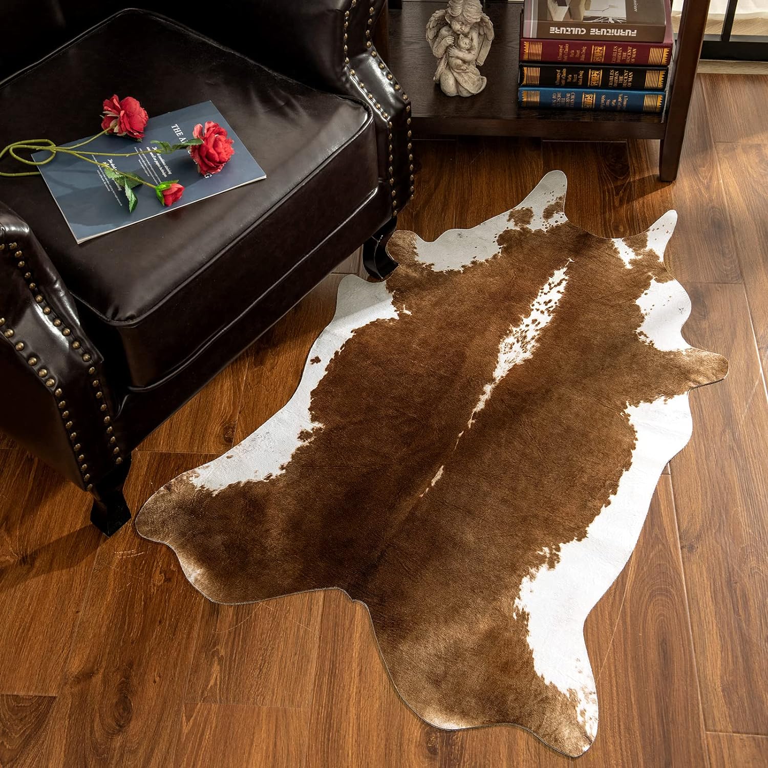 Classic brown and white faux cowhide rug from CowKobe - rustic Western style