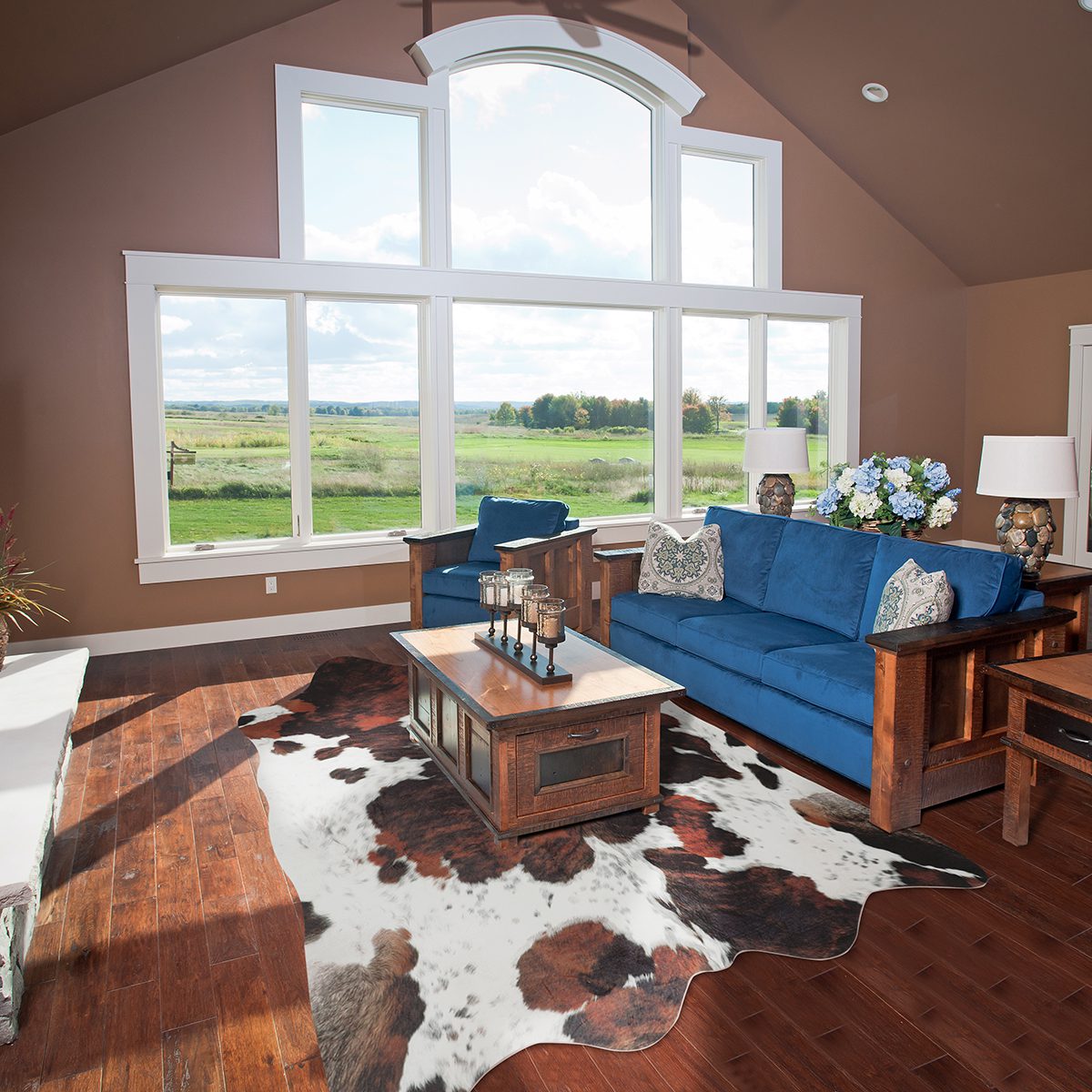 Close-up of a faux cowhide rug texture in earthy tones